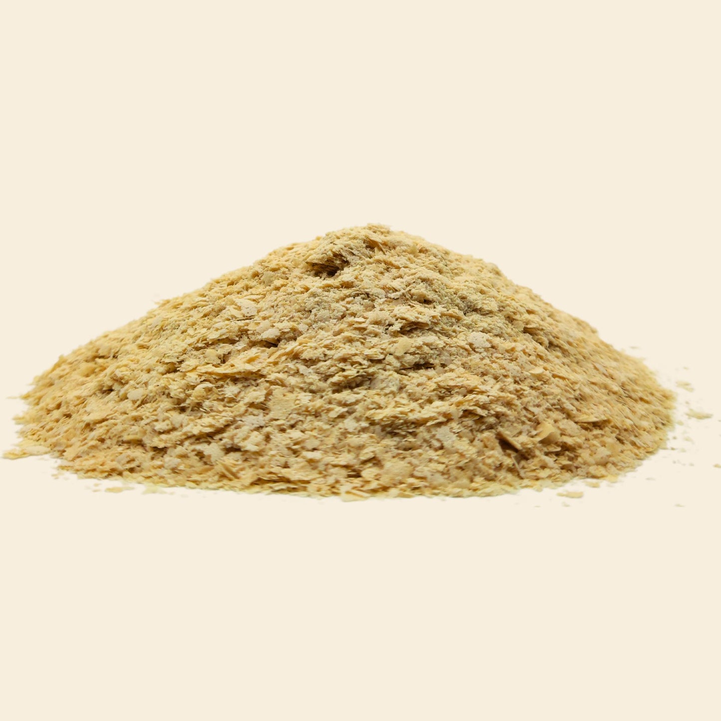 Unfortified nutritional yeast flakes closeup - golden savoury superfood