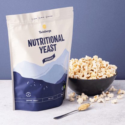 Popcorn topped with organic nutritional yeast - healthy organic snack recipe